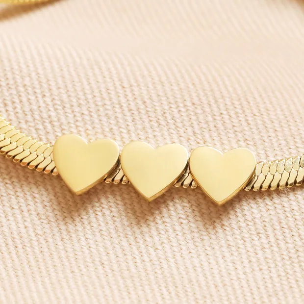 Stainless Steel Three Heart Charm Herringbone Bracelet in Gold