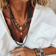 Goupi Black Hematite Beaded Necklace with Gold Eye Charms