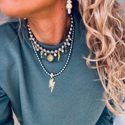 Goupi Black Bead & Thunder Bold Charm Necklace