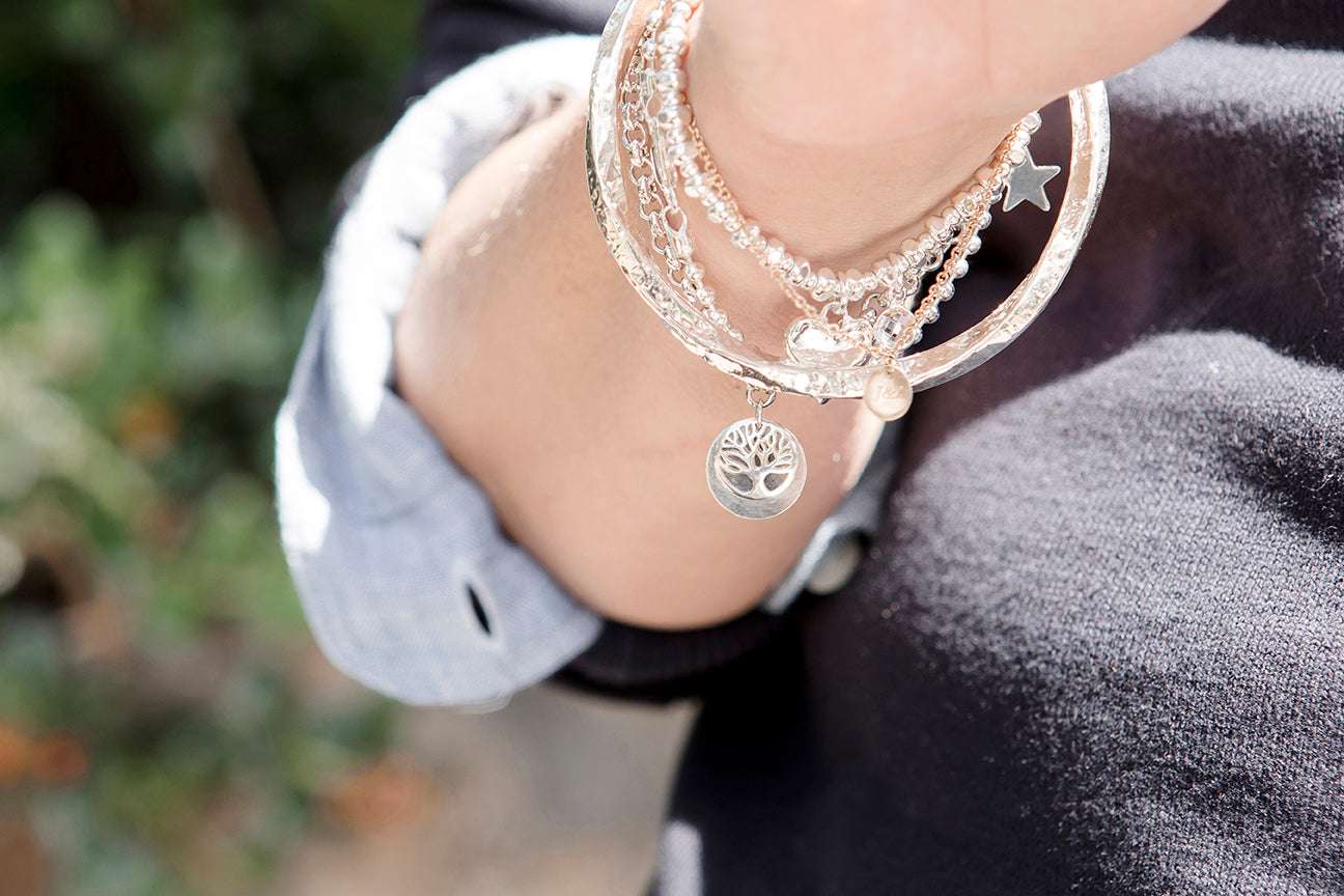 Stretchy Silver Ball Bracelet With Heart Charm