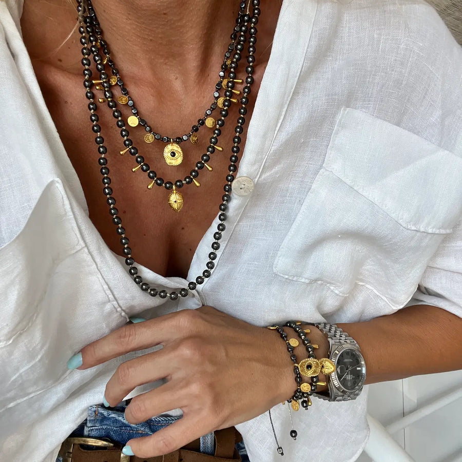 Goupi Black Hematite Beaded Necklace with Gold Eye Charms