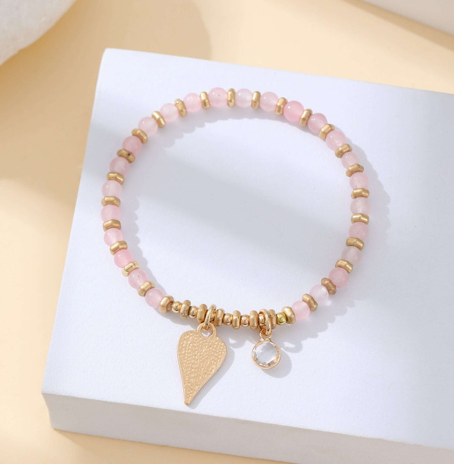 Gold and blush pink stretchy heart bead bracelet