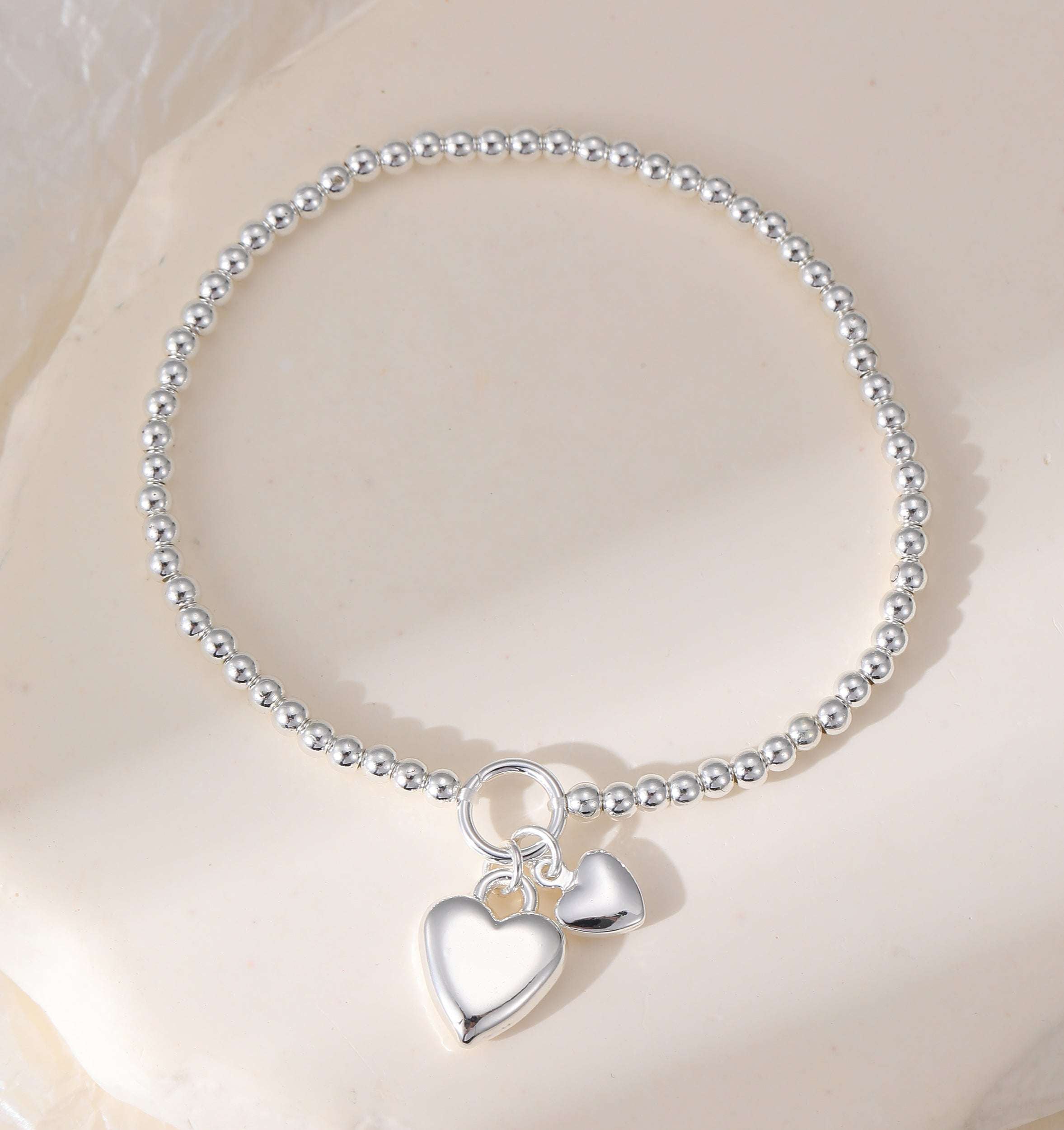 Stretchy Silver Ball Bracelet With Heart Charm