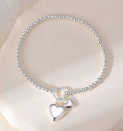Stretchy Silver Ball Bracelet With Heart Charm