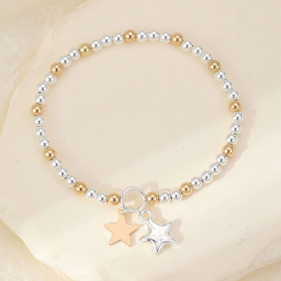 Stretchy gold and silver star bracelet