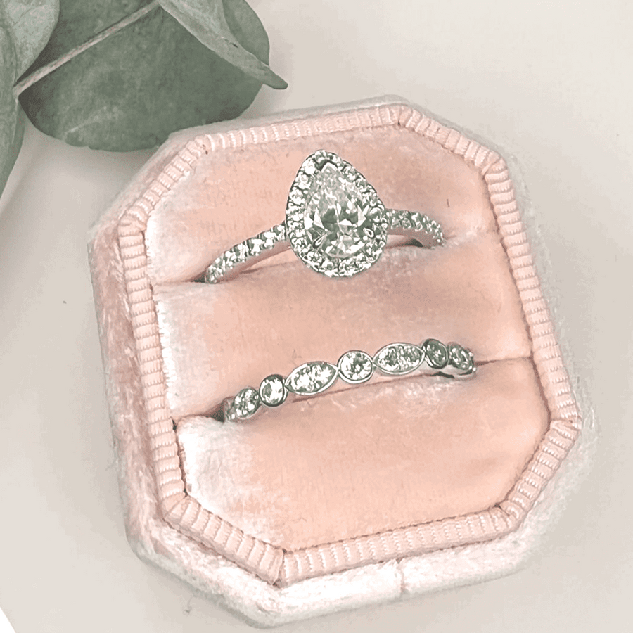 Platinum And Pear Cut Diamond Halo Engagement Ring